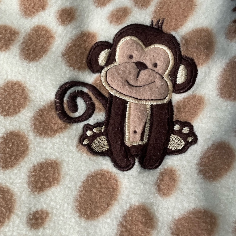 Spotted monkey baby blanket